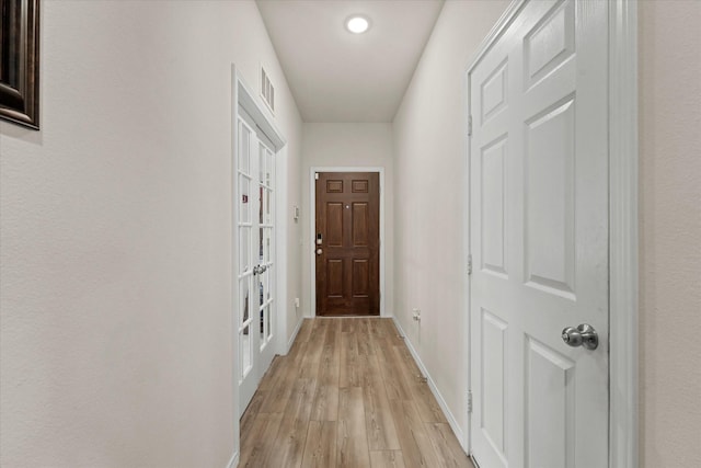 1145 Vernon Dr, Aubrey, TX 76227 - doorway featuring baseboards, light wood finished floors, and recessed lighting