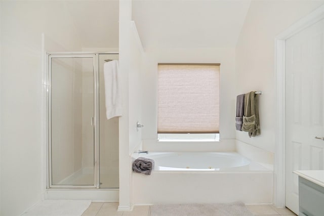 8652 Fernhill Dr, Fort Worth, TX 76123 - carpeted bedroom with ensuite bath, lofted ceiling, a ceiling fan, and baseboards