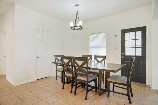 8652 Fernhill Dr, Fort Worth, TX 76123 - bedroom featuring arched walkways, light tile patterned floors, and baseboards