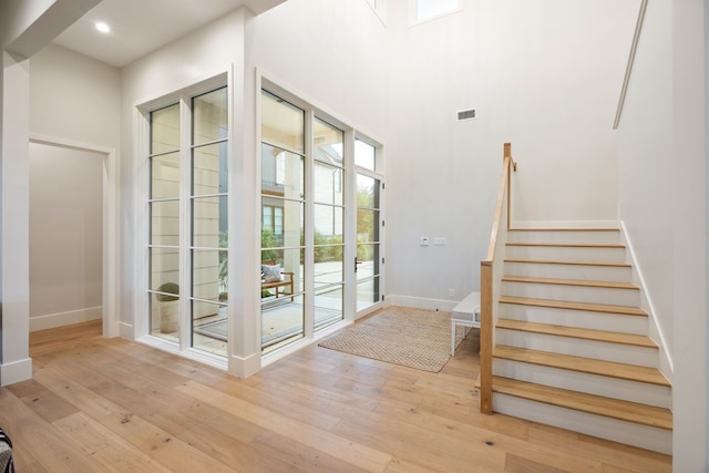 13736 Waterside Dr, Malakoff, TX 75148 - doorway with baseboards, light wood-style flooring, stairs, and recessed lighting