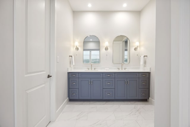 13736 Waterside Dr, Malakoff, TX 75148 - bathroom featuring marble finish flooring, double vanity, baseboards, and recessed lighting