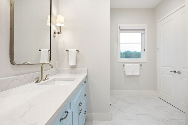 13736 Waterside Dr, Malakoff, TX 75148 - bathroom with marble look tile flooring, baseboards, and vanity