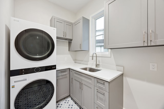 13736 Waterside Dr, Malakoff, TX 75148 - washroom with estacked washer and dryer and cabinet space