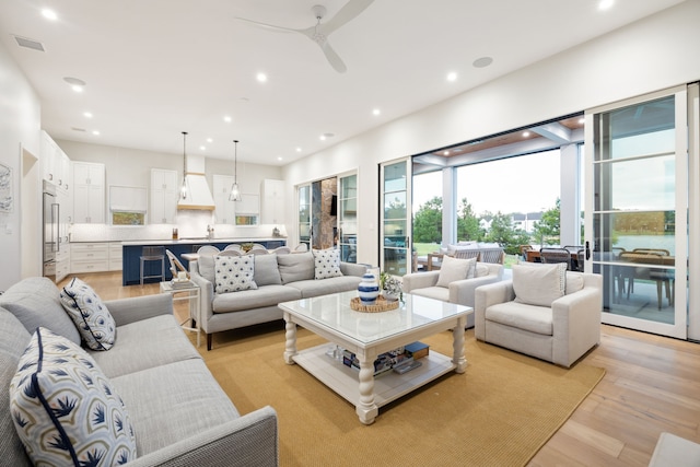 13736 Waterside Dr, Malakoff, TX 75148 - living room with light wood-type flooring, recessed lighting, and ceiling fan