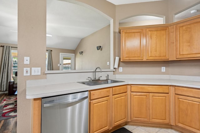 8833 Stirrup Way, Fort Worth, TX 76244 - kitchen featuring stainless steel dishwasher, a sink, vaulted ceiling, light countertops, and arched walkways