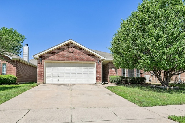 8833 Stirrup Way, Fort Worth, TX 76244 - view of front of property featuring brick siding, driveway, a front yard, and an attached garage
