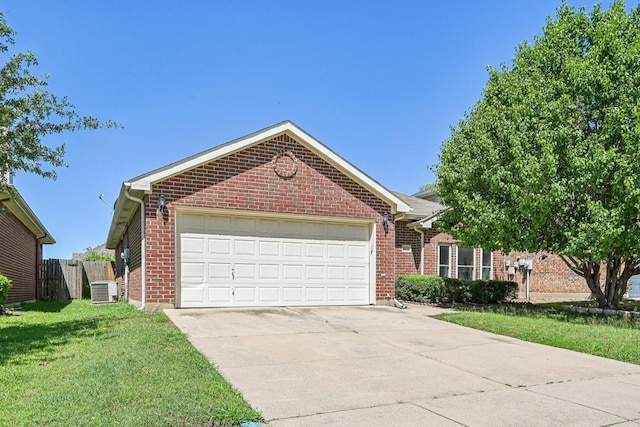 8833 Stirrup Way, Fort Worth, TX 76244 - view of front facade with central AC unit, brick siding, concrete driveway, and a garage