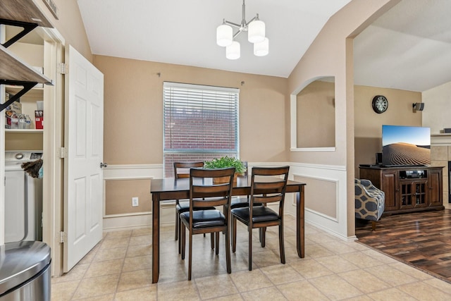 8833 Stirrup Way, Fort Worth, TX 76244 - dining area featuring lofted ceiling, a chandelier, baseboards, and light tile patterned floors