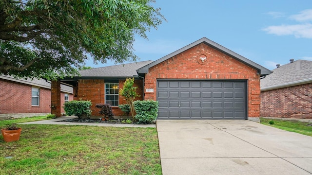 12712 Feathering Dr, Frisco, TX 75036 - ranch-style home featuring brick siding, an attached garage, concrete driveway, and a front lawn