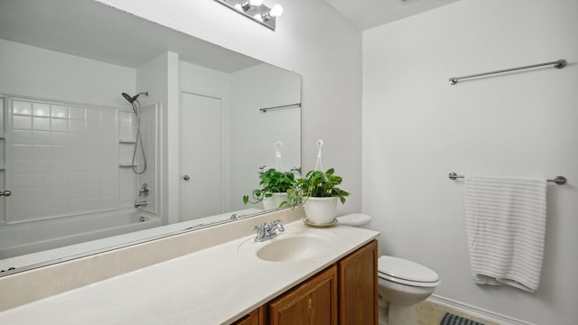 12712 Feathering Dr, Frisco, TX 75036 - bathroom featuring toilet, vanity, and bathtub / shower combination