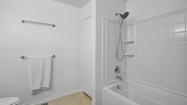 12712 Feathering Dr, Frisco, TX 75036 - bathroom featuring toilet, shower / bath combination, and baseboards