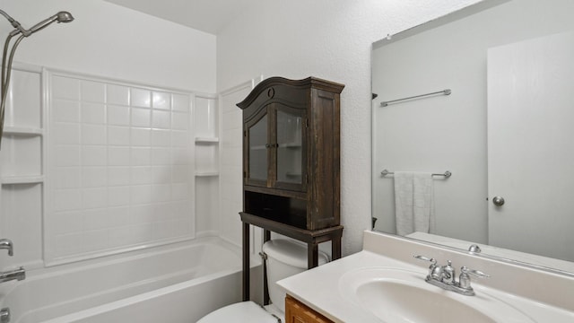 12712 Feathering Dr, Frisco, TX 75036 - bathroom featuring toilet, vanity, and bathtub / shower combination