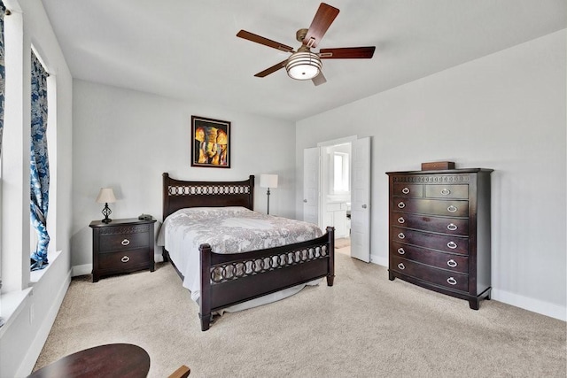 carpeted bedroom with baseboards and ceiling fan