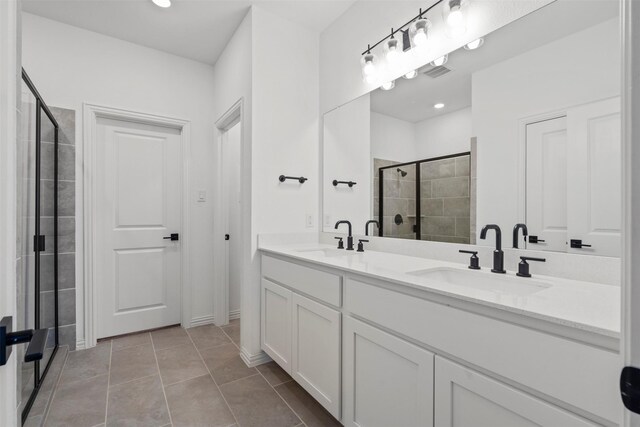1420 Escondido Dr, Fort Worth, TX 76052 - full bath with a stall shower, double vanity, tile patterned floors, and recessed lighting
