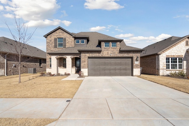 1420 Escondido Dr, Fort Worth, TX 76052 - view of front facade featuring driveway, cooling unit, a shingled roof, brick siding, and a front lawn
