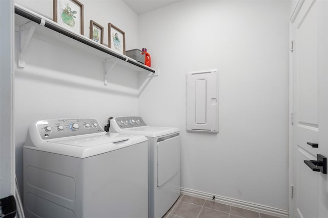 1420 Escondido Dr, Fort Worth, TX 76052 - laundry room with washing machine and clothes dryer, light tile patterned floors, baseboards, and electric panel