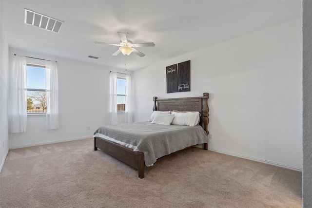 1420 Escondido Dr, Fort Worth, TX 76052 - carpeted bedroom with multiple windows, baseboards, and a ceiling fan