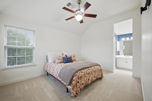 2099 Remington Ln, Frisco, TX 75033 - bedroom featuring lofted ceiling, light carpet, baseboards, ensuite bath, and a ceiling fan