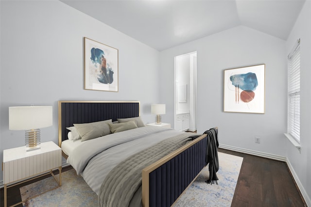 2099 Remington Ln, Frisco, TX 75033 - bedroom featuring wood finished floors, vaulted ceiling, baseboards, and connected bathroom