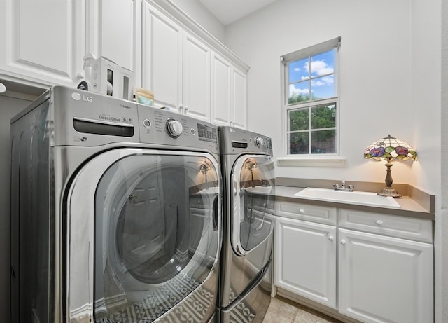 2099 Remington Ln, Frisco, TX 75033 - clothes washing area featuring separate washer and dryer and cabinet space