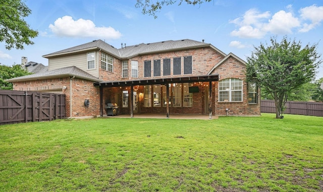 2099 Remington Ln, Frisco, TX 75033 - rear view of property with brick siding, a patio, and a gate