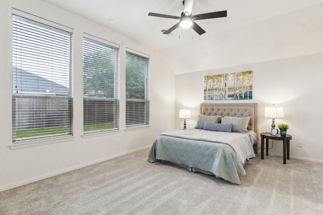 bedroom featuring carpet, baseboards, and a ceiling fan