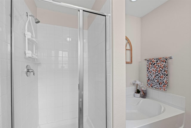 1744 Wildflower Ln, Wylie, TX 75098 - bathroom featuring a shower stall and a garden tub
