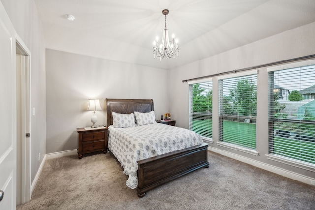 bedroom featuring carpet, baseboards, and a chandelier