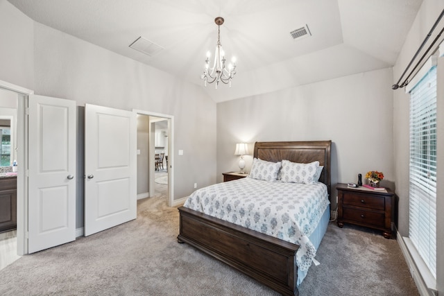 bedroom featuring vaulted ceiling, light carpet, a chandelier, and baseboards