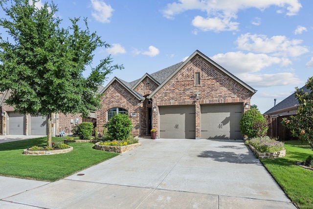 view of front of house with brick siding, a garage, and concrete driveway