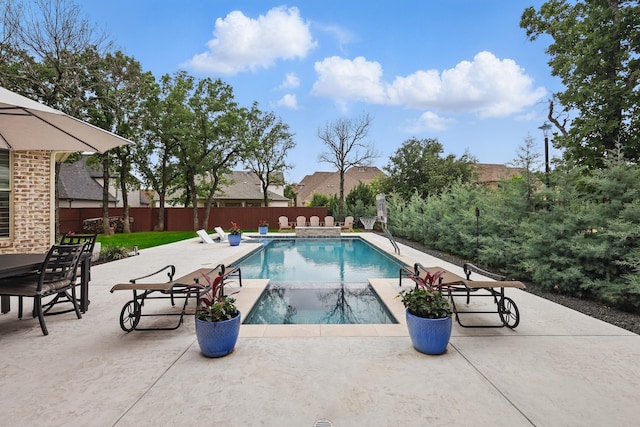 304 Nora Ln, Argyle, TX 76226 - view of swimming pool featuring a patio area and a pool with connected hot tub