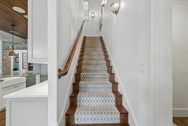 304 Nora Ln, Argyle, TX 76226 - stairway with wood finished floors, wood ceiling, and baseboards
