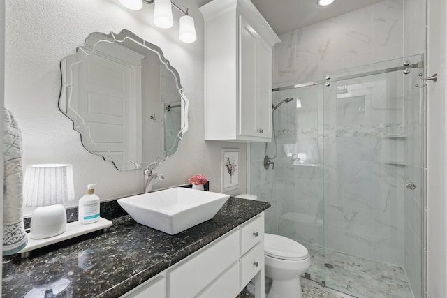 304 Nora Ln, Argyle, TX 76226 - full bath with a stall shower, vanity, toilet, and recessed lighting