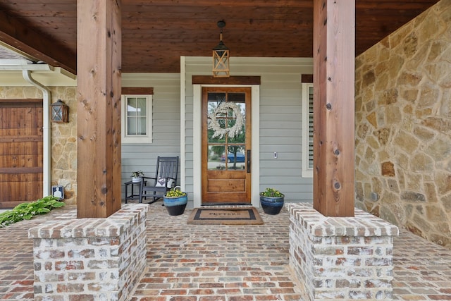 304 Nora Ln, Argyle, TX 76226 - view of exterior entry with covered porch and stone siding