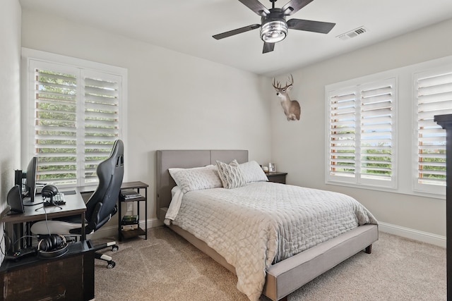 304 Nora Ln, Argyle, TX 76226 - carpeted bedroom with a desk, baseboards, and ceiling fan