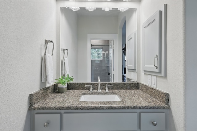 304 Nora Ln, Argyle, TX 76226 - bathroom with vanity and a textured wall