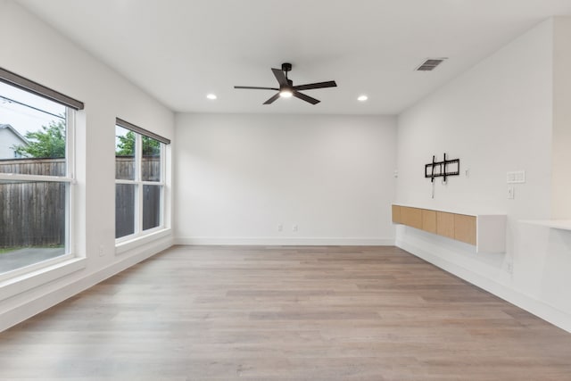 1967 Bayside St, Dallas, TX 75212 - unfurnished room with a ceiling fan, recessed lighting, light wood-type flooring, and baseboards