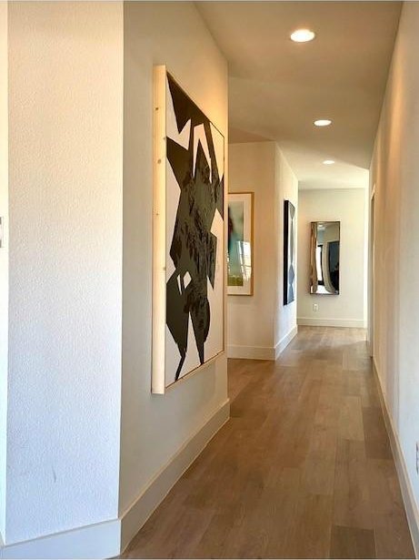 1967 Bayside St, Dallas, TX 75212 - hallway with wood finished floors, recessed lighting, and baseboards