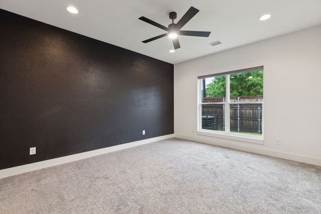 1967 Bayside St, Dallas, TX 75212 - empty room featuring light carpet, a ceiling fan, recessed lighting, and baseboards