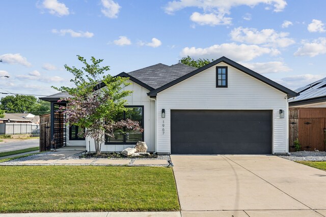1967 Bayside St, Dallas, TX 75212 - modern inspired farmhouse featuring concrete driveway and an attached garage