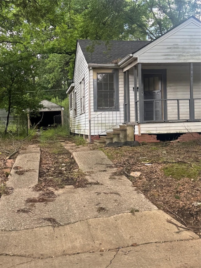 2918 Midway St, Shreveport, LA 71109 - view of front of property featuring a shingled roof and a porch
