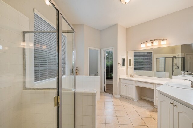 2713 Pasadena Pl, Flower Mound, TX 75022 - bathroom featuring a shower stall, tile patterned flooring, and two vanities