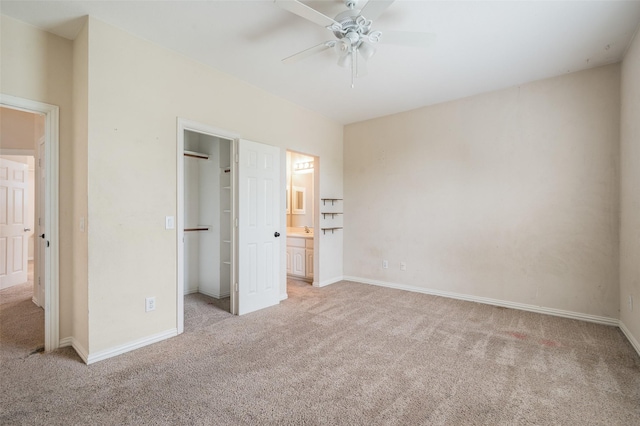 2713 Pasadena Pl, Flower Mound, TX 75022 - unfurnished bedroom with light carpet, a spacious closet, a closet, baseboards, and ensuite bathroom