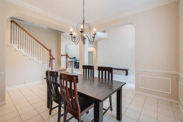 2713 Pasadena Pl, Flower Mound, TX 75022 - dining space featuring arched walkways, stairs, light tile patterned floors, ornamental molding, and a chandelier