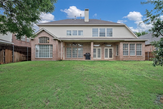 2713 Pasadena Pl, Flower Mound, TX 75022 - rear view of property featuring ceiling fan, brick siding, and a chimney