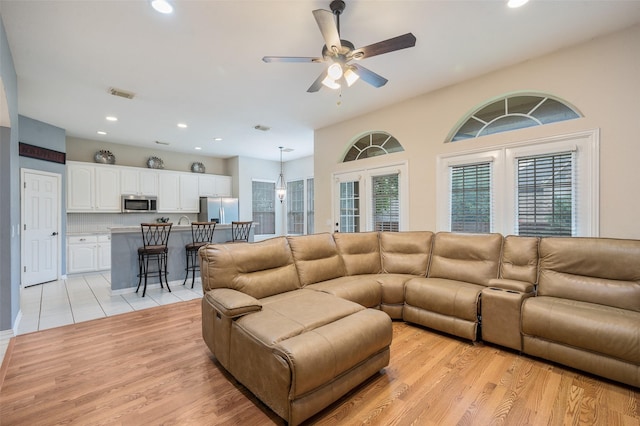 2713 Pasadena Pl, Flower Mound, TX 75022 - living room featuring recessed lighting, a ceiling fan, and light wood-type flooring