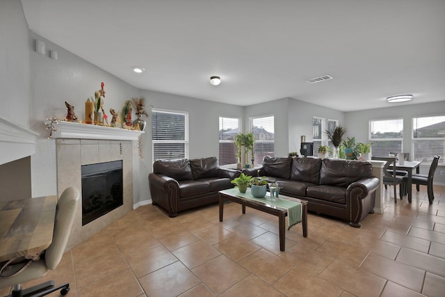 3503 Ridge Crossing Dr, Dallas, TX 75227 - living room with a fireplace, baseboards, and light tile patterned flooring