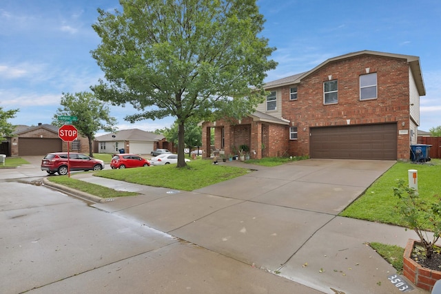 3503 Ridge Crossing Dr, Dallas, TX 75227 - traditional-style house with brick siding, concrete driveway, a garage, and a front yard