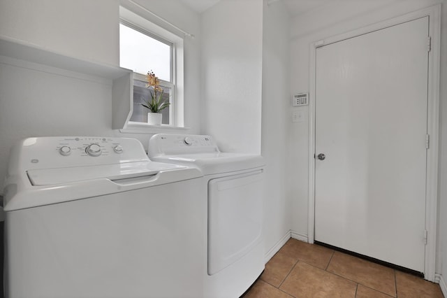 3503 Ridge Crossing Dr, Dallas, TX 75227 - laundry area featuring separate washer and dryer and tile patterned flooring