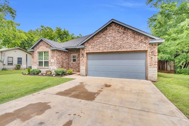 306 N Pendell Ave, Cleburne, TX 76033 - single story home featuring brick siding, driveway, and an attached garage